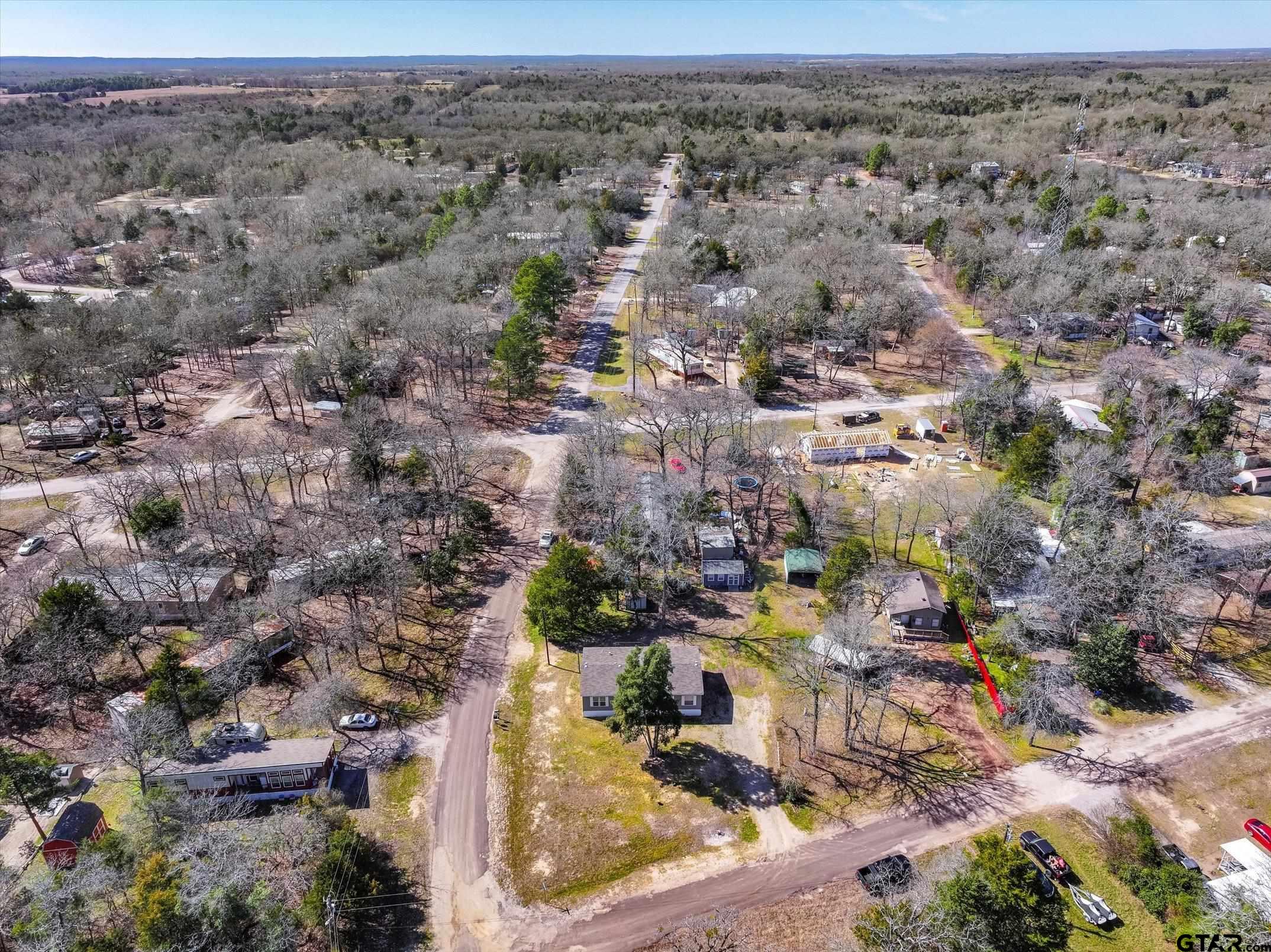 129 Elm Drive Murchison, TX 75778 - Photo 2 of 34 an aerial view of a houses with a yard