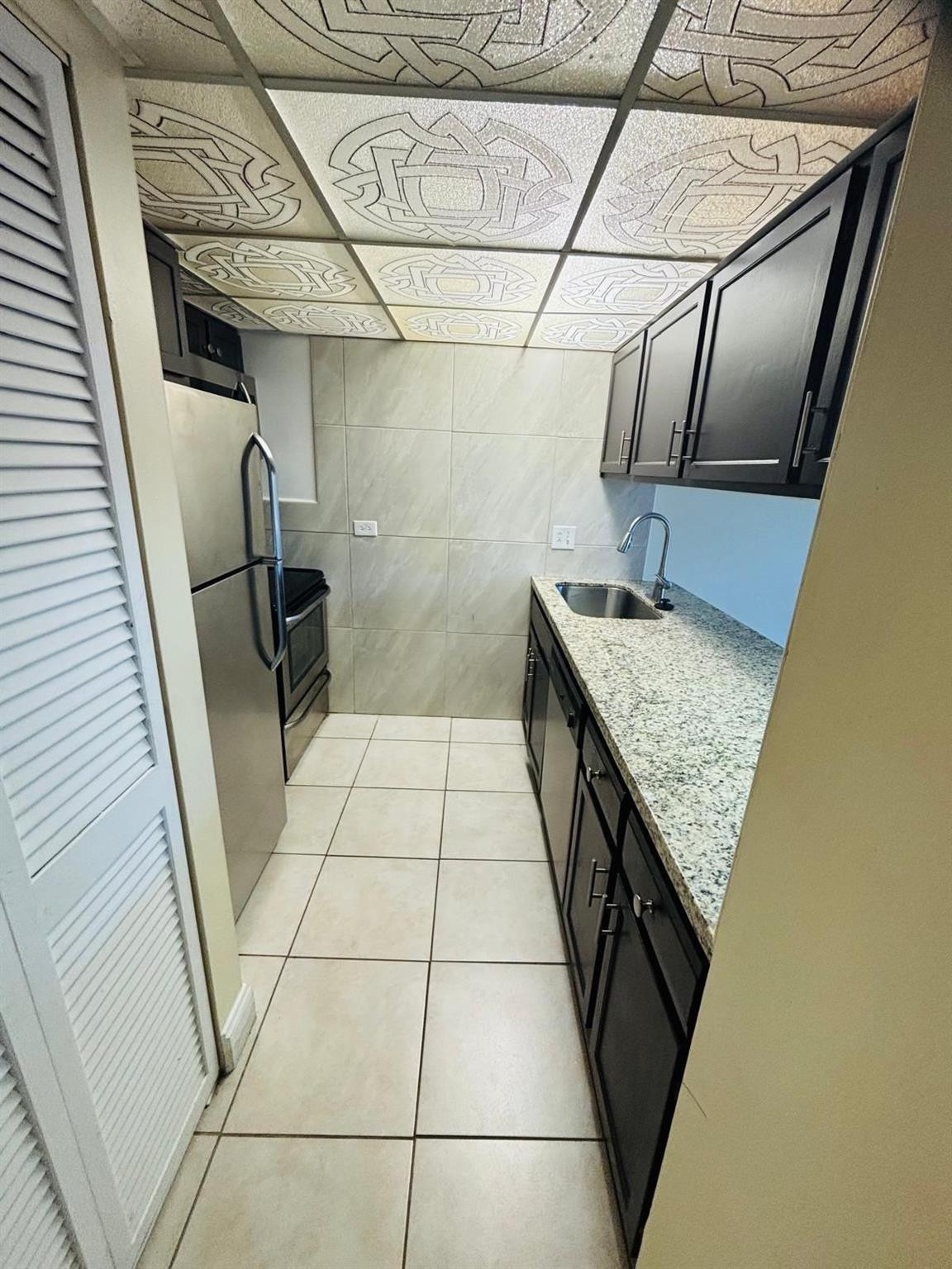 3730 Inverrary Drive, Unit 1M Lauderhill, FL 33319 - Photo 8 of 11 Photo 9