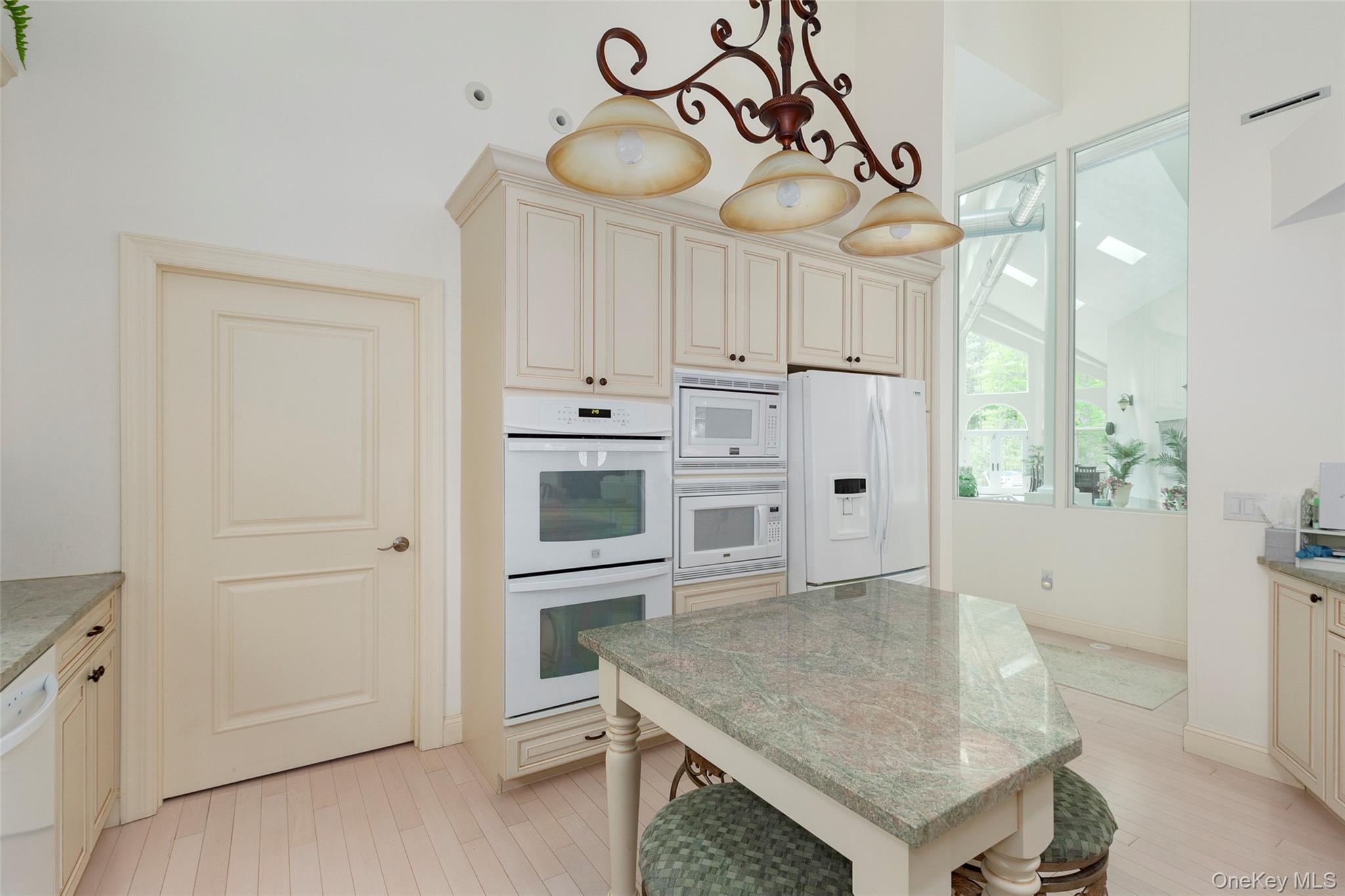 126 Old Hopewell Road Wappingers Falls, NY 12590 - Photo 10 of 38 a kitchen with cabinets and wooden floor