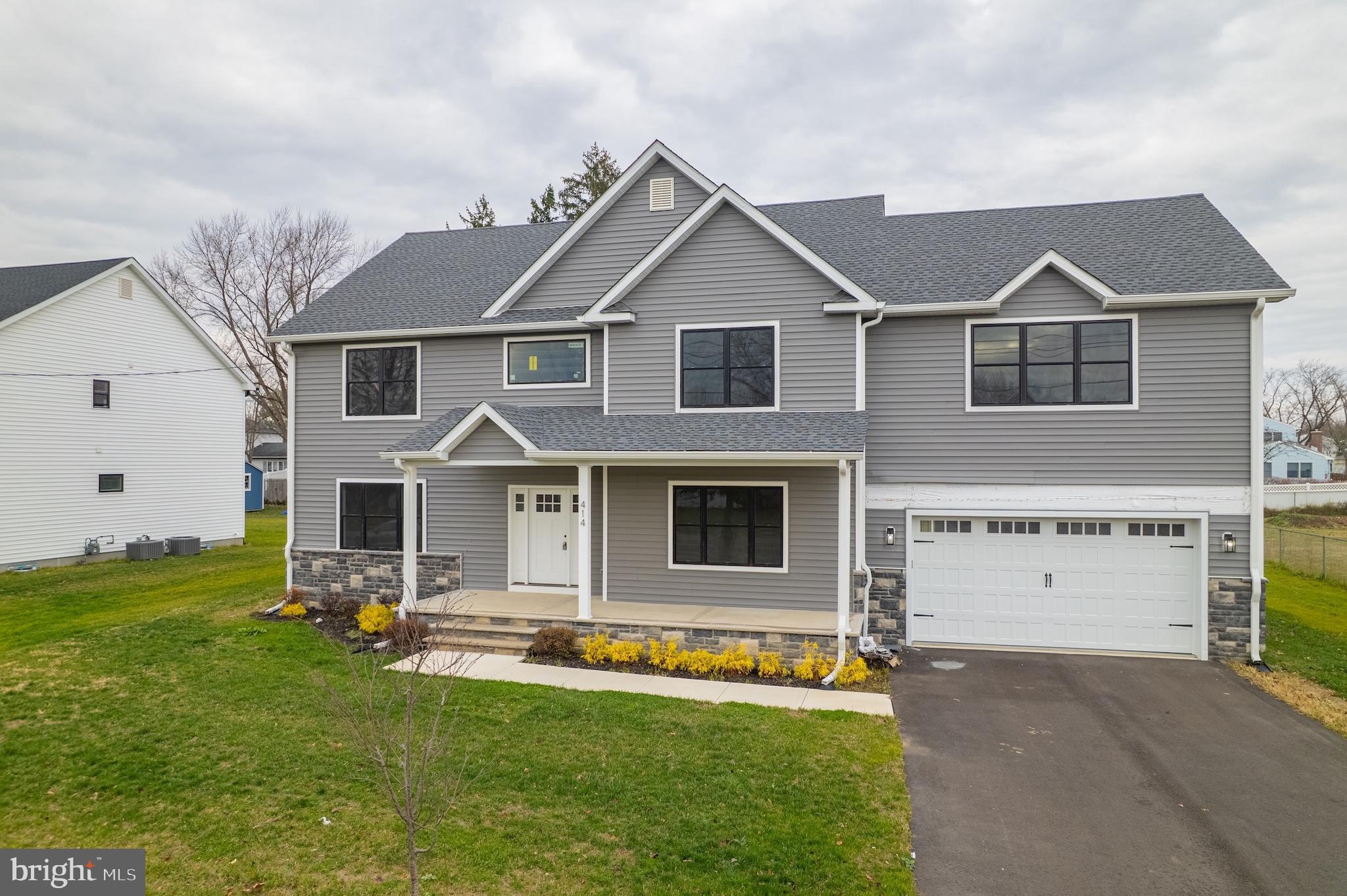 414 Flock Road Hamilton, NJ 08619 - Photo 11 of 60 a front view of a house with a yard