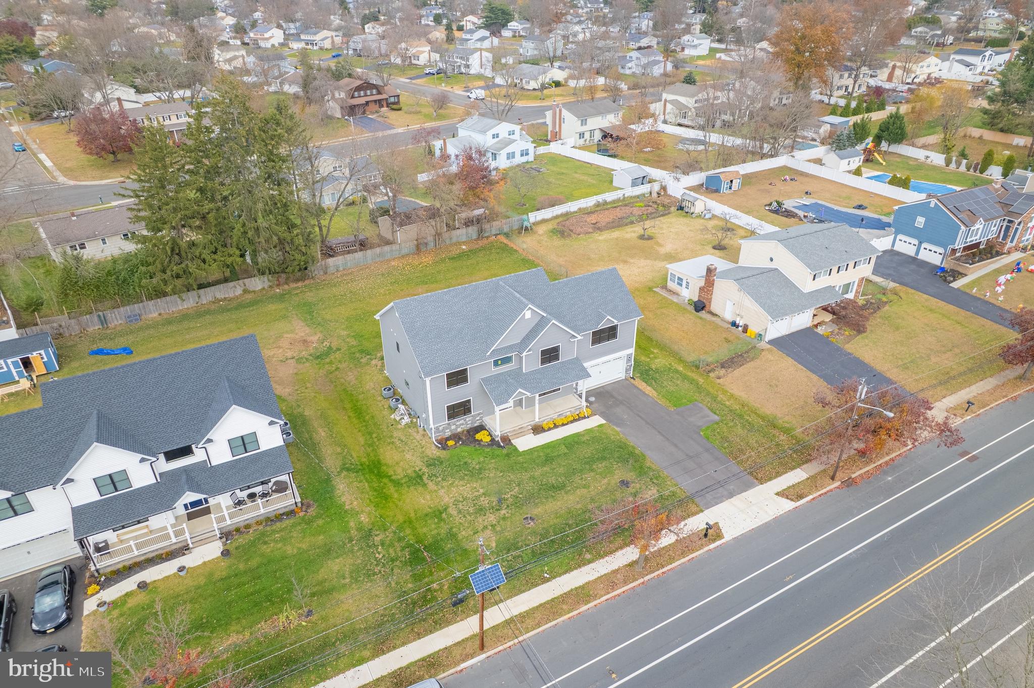 414 Flock Road Hamilton, NJ 08619 - Photo 16 of 60 an aerial view of residential houses with yard