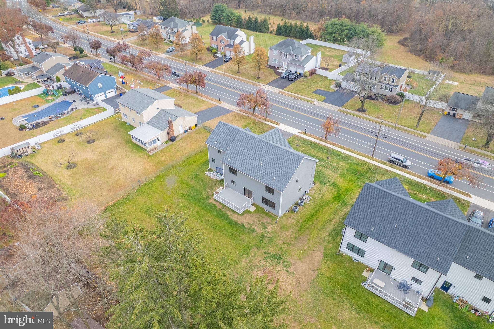 414 Flock Road Hamilton, NJ 08619 - Photo 19 of 60 an aerial view of a house with a swimming pool
