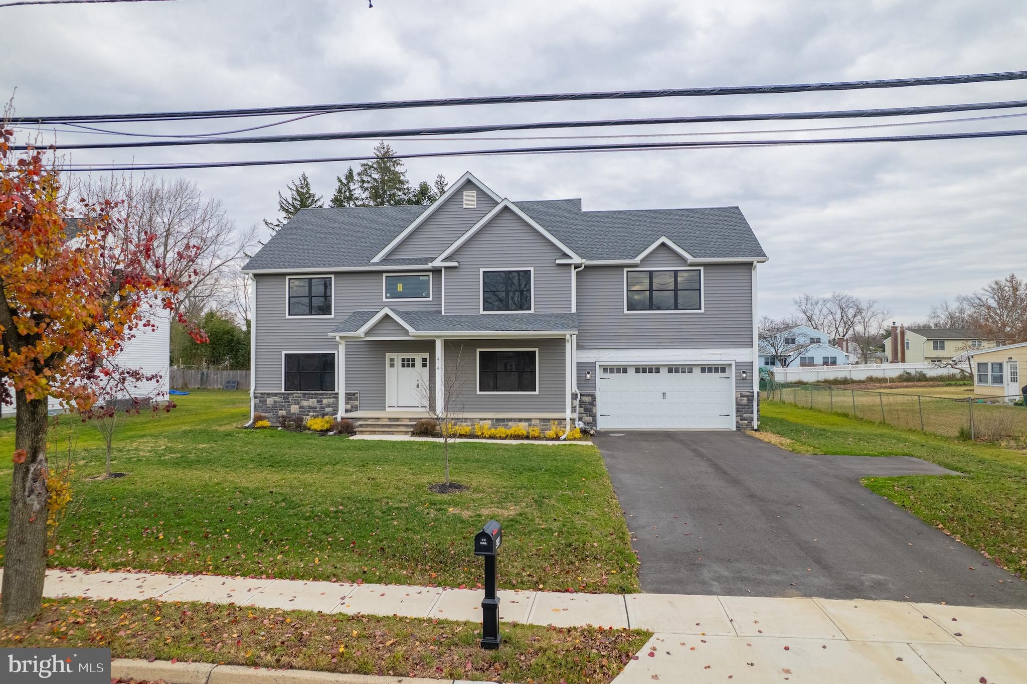 414 Flock Road Hamilton, NJ 08619 - Photo 2 of 60 a front view of a house with garden