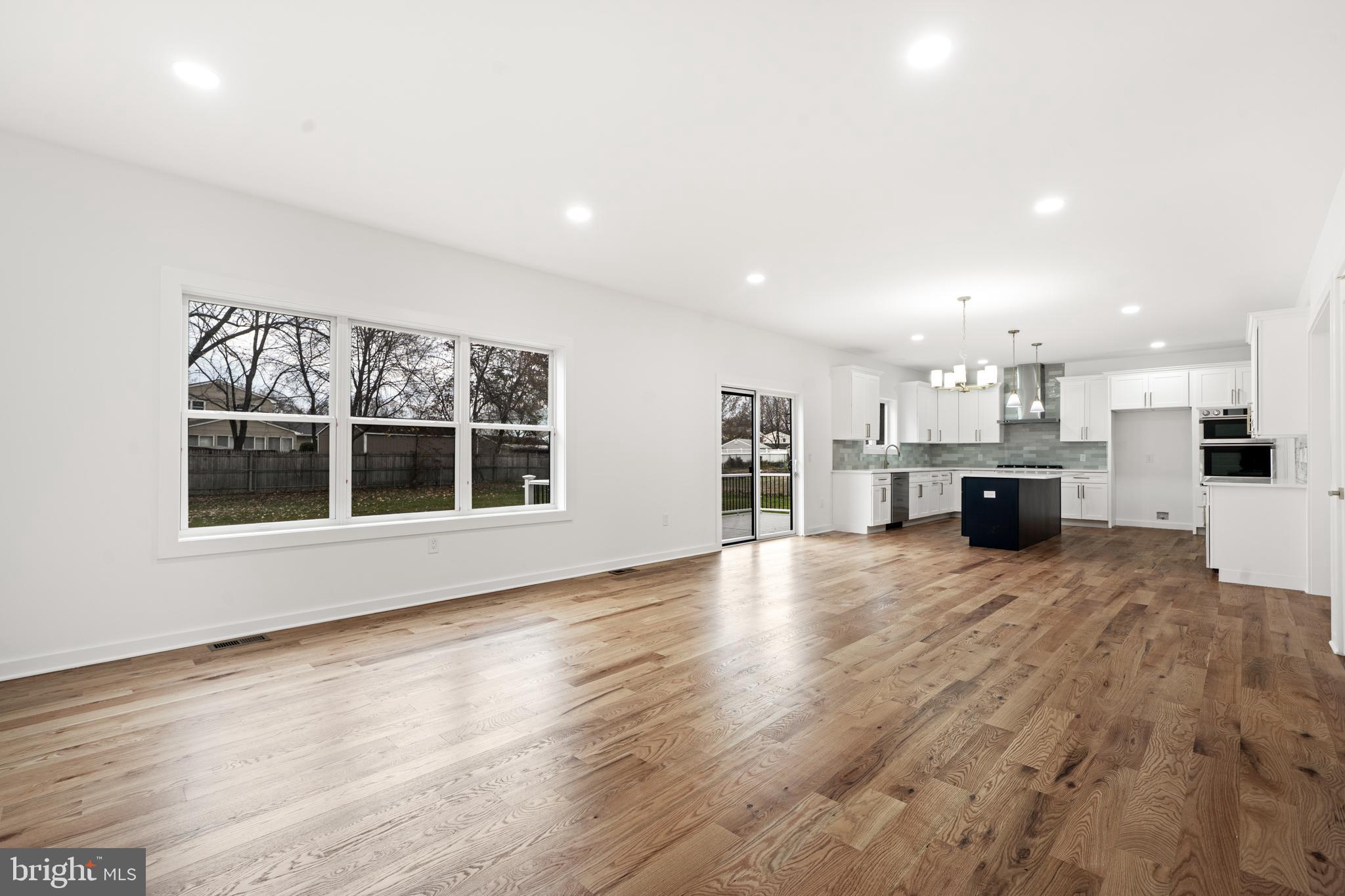 414 Flock Road Hamilton, NJ 08619 - Photo 30 of 60 a view of kitchen and kitchen with furniture wooden floor and window