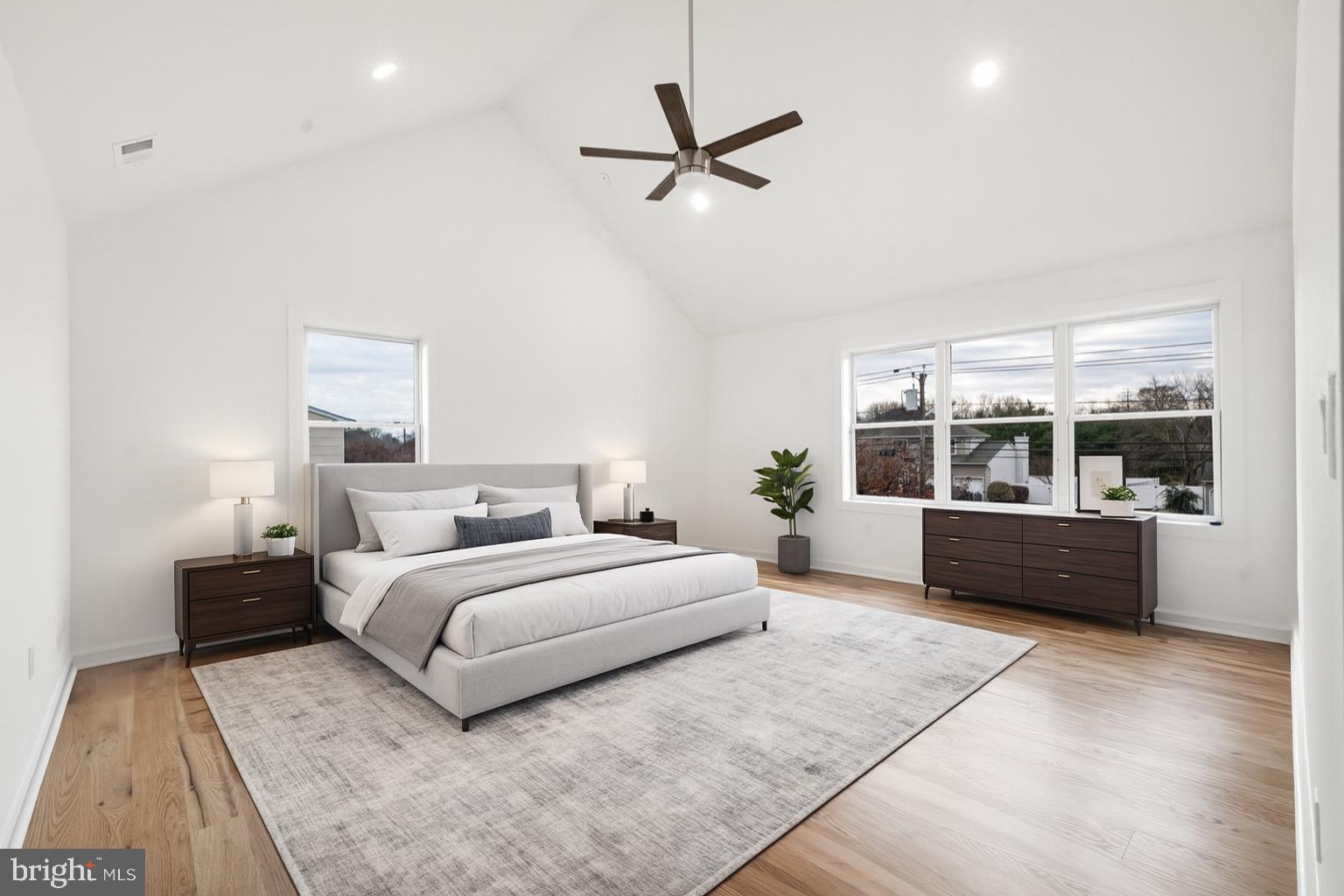 414 Flock Road Hamilton, NJ 08619 - Photo 35 of 60 a bedroom with a large bed and a large window