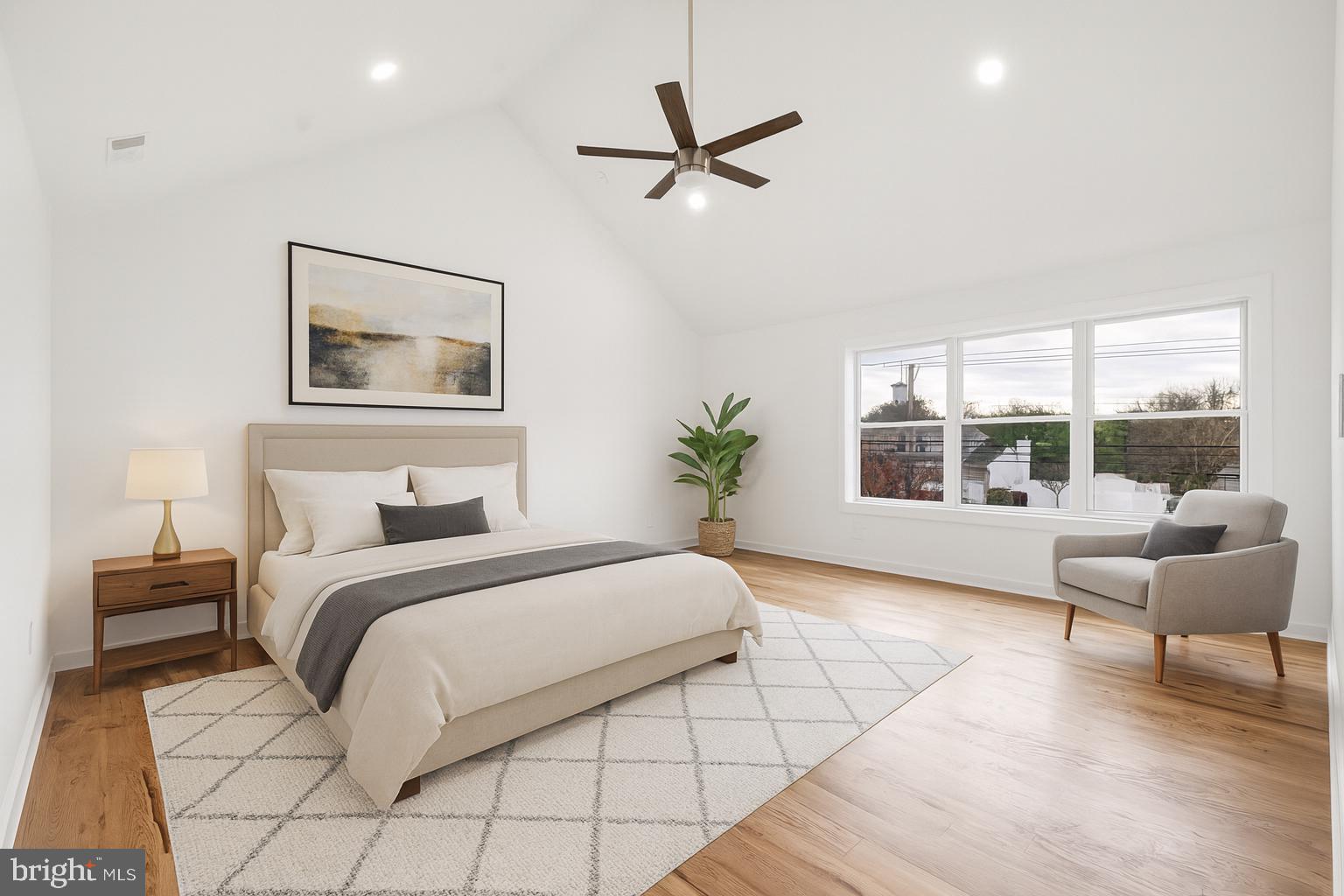 414 Flock Road Hamilton, NJ 08619 - Photo 37 of 60 a bedroom with a large bed and a large window