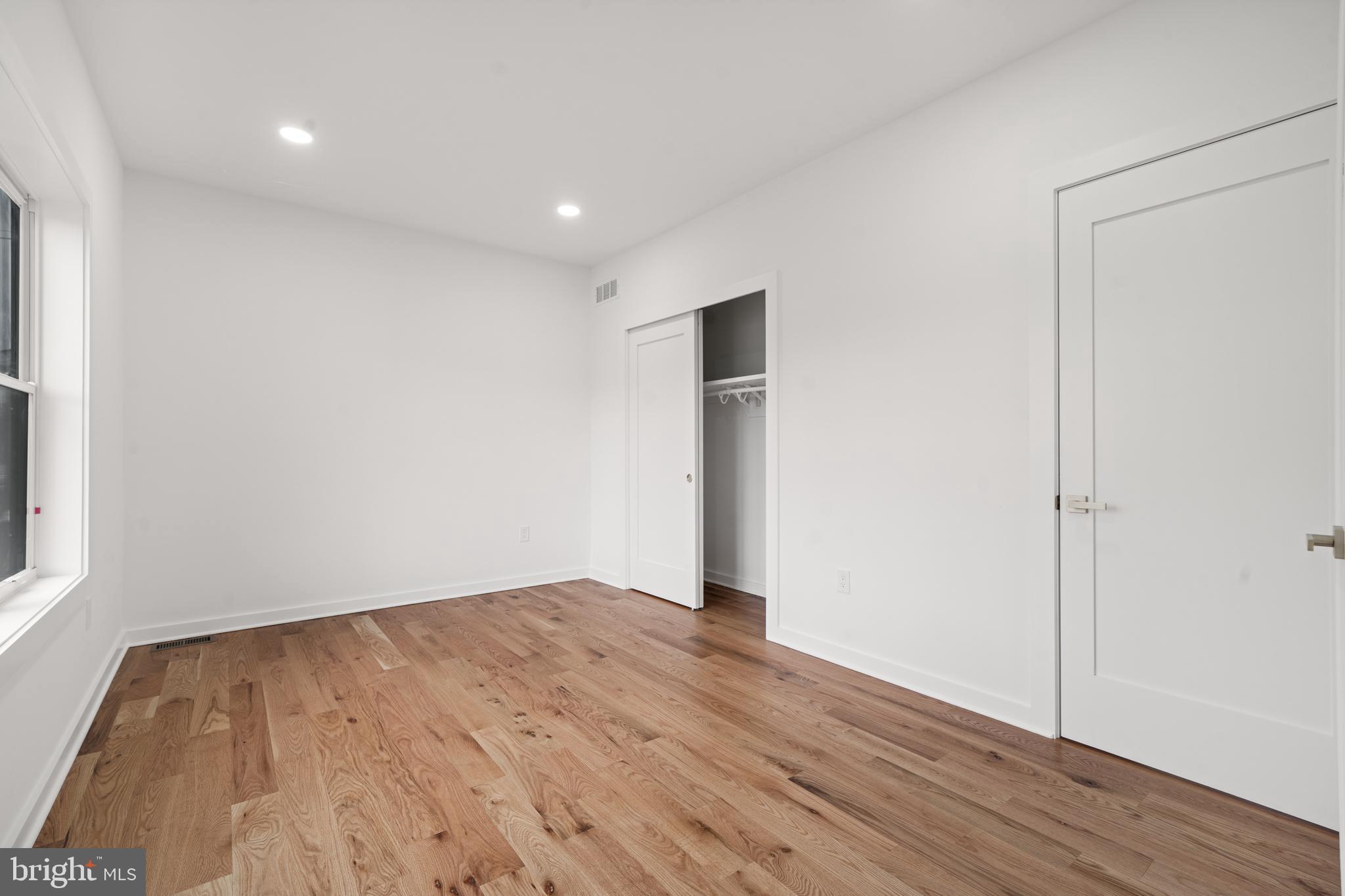 414 Flock Road Hamilton, NJ 08619 - Photo 46 of 60 a view of an empty room with wooden floor