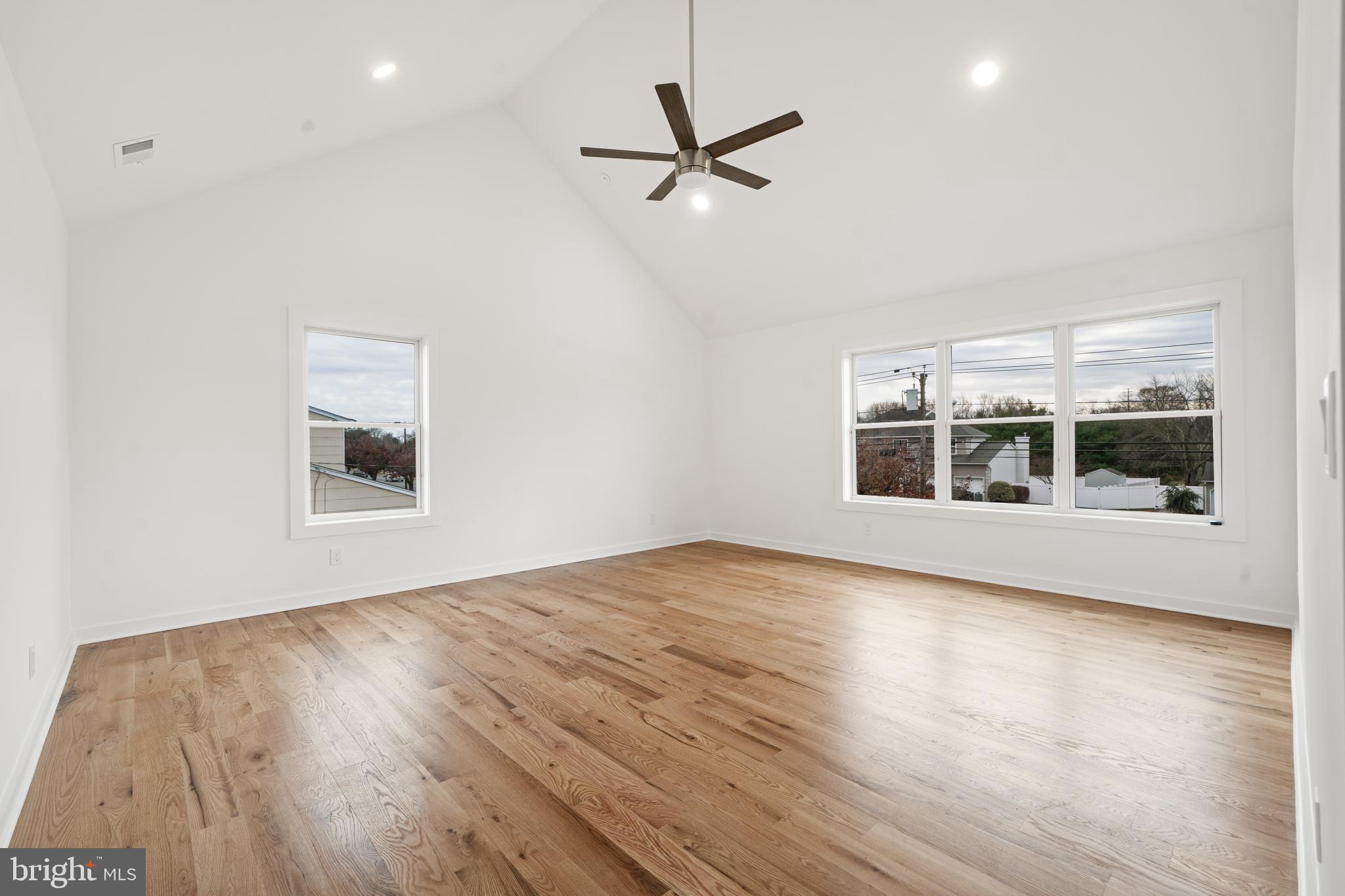 414 Flock Road Hamilton, NJ 08619 - Photo 52 of 60 a view of a livingroom with a ceiling fan and window