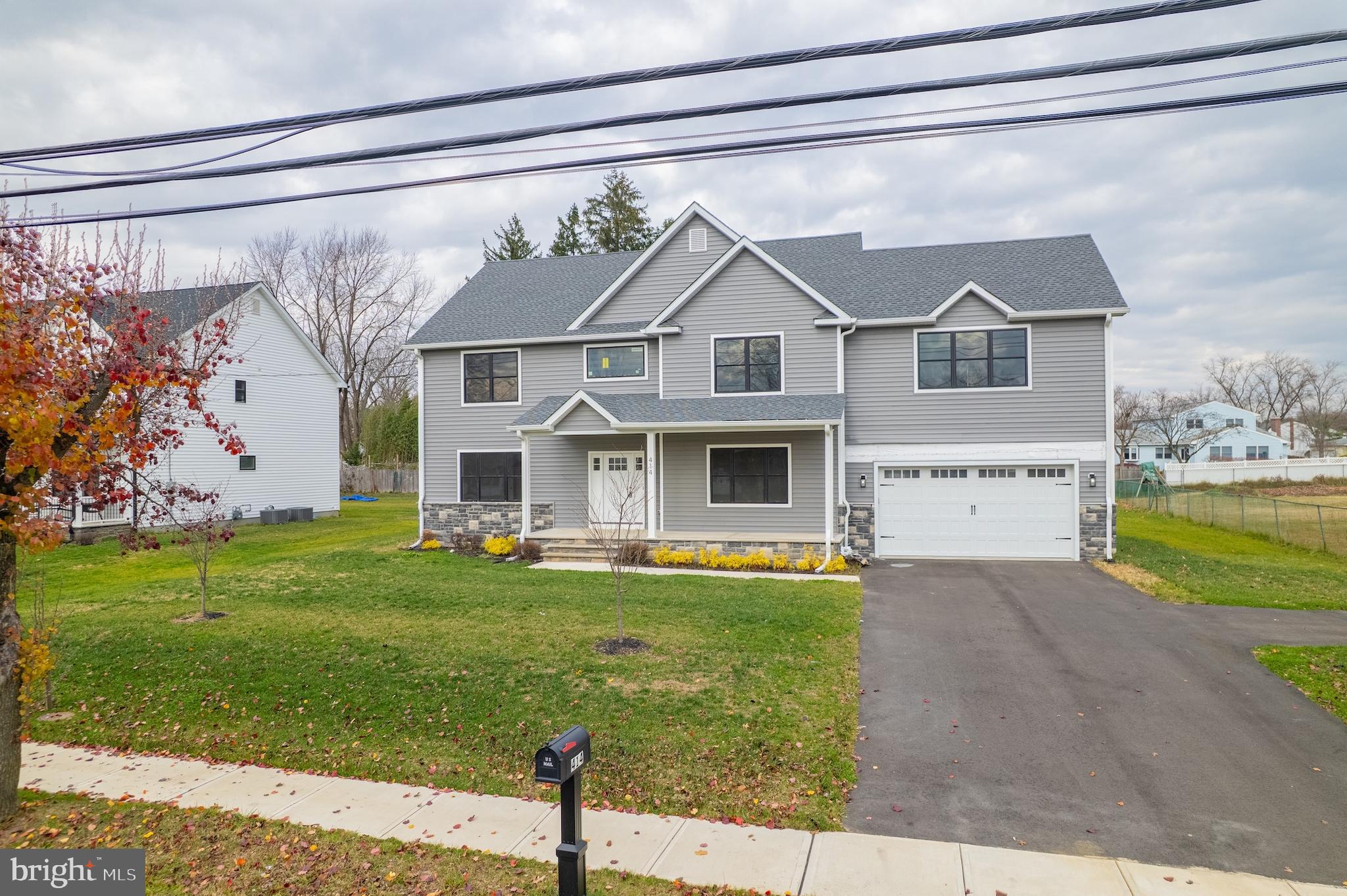 414 Flock Road Hamilton, NJ 08619 - Photo 10 of 60 a front view of a house with a yard