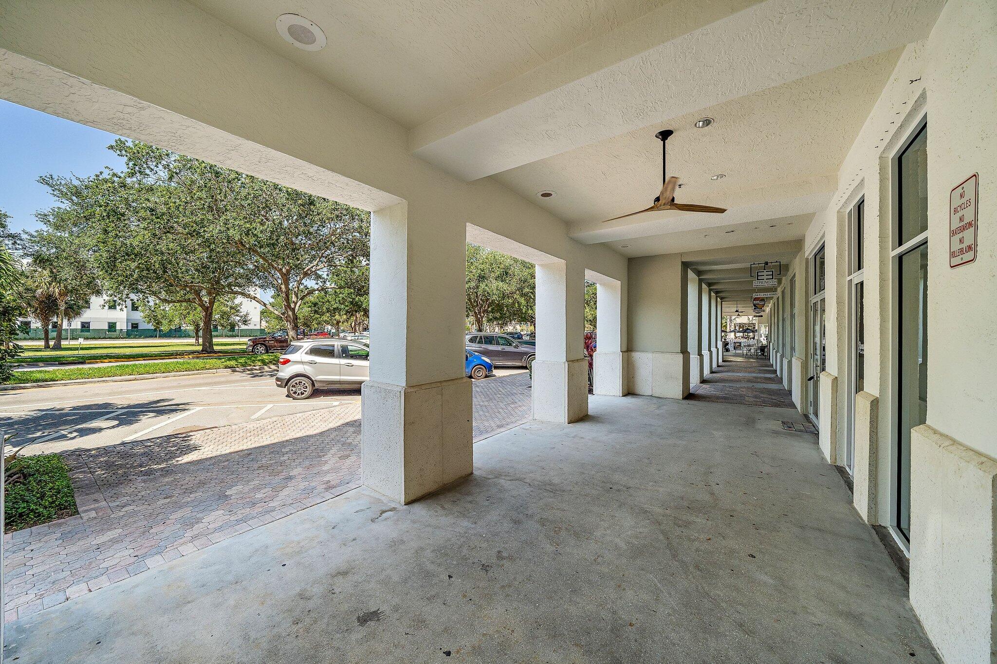 1200 Town Center Drive, Unit 427 Jupiter, FL 33458 - Photo 32 of 33 a view of a porch with seating space