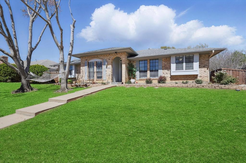 906 Fairfield Lane Flower Mound, TX 75028 - Photo 1 of 40 a front view of house with yard patio and green space