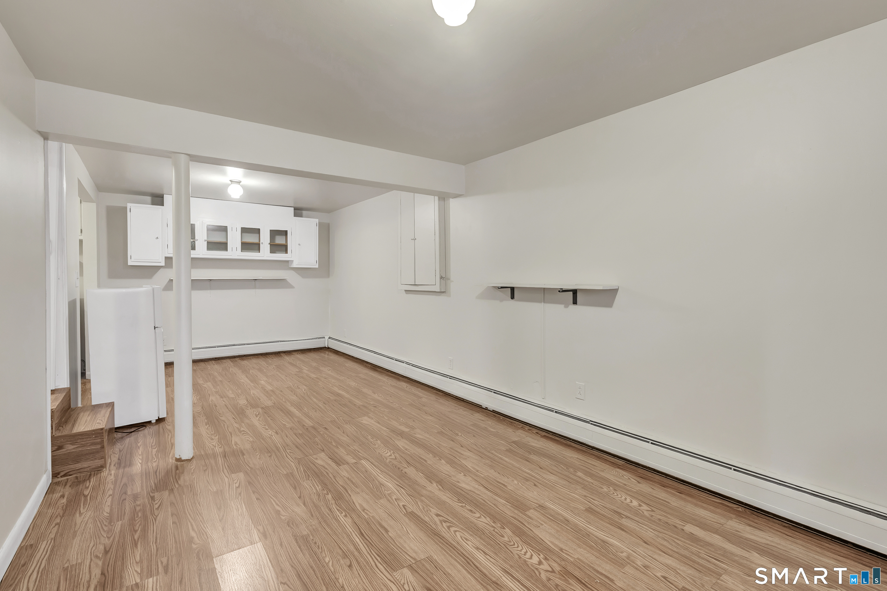 123 River Road Shelton, CT 06484 - Photo 16 of 27 wooden floor in an empty room