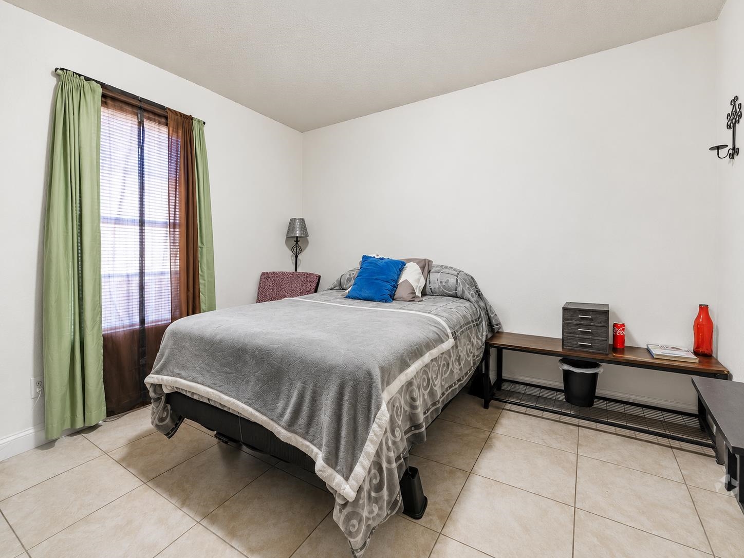 3236 Millington Road Memphis, TN 38127 - Photo 12 of 31 Bedroom featuring neutral-toned tile flooring and white painted walls