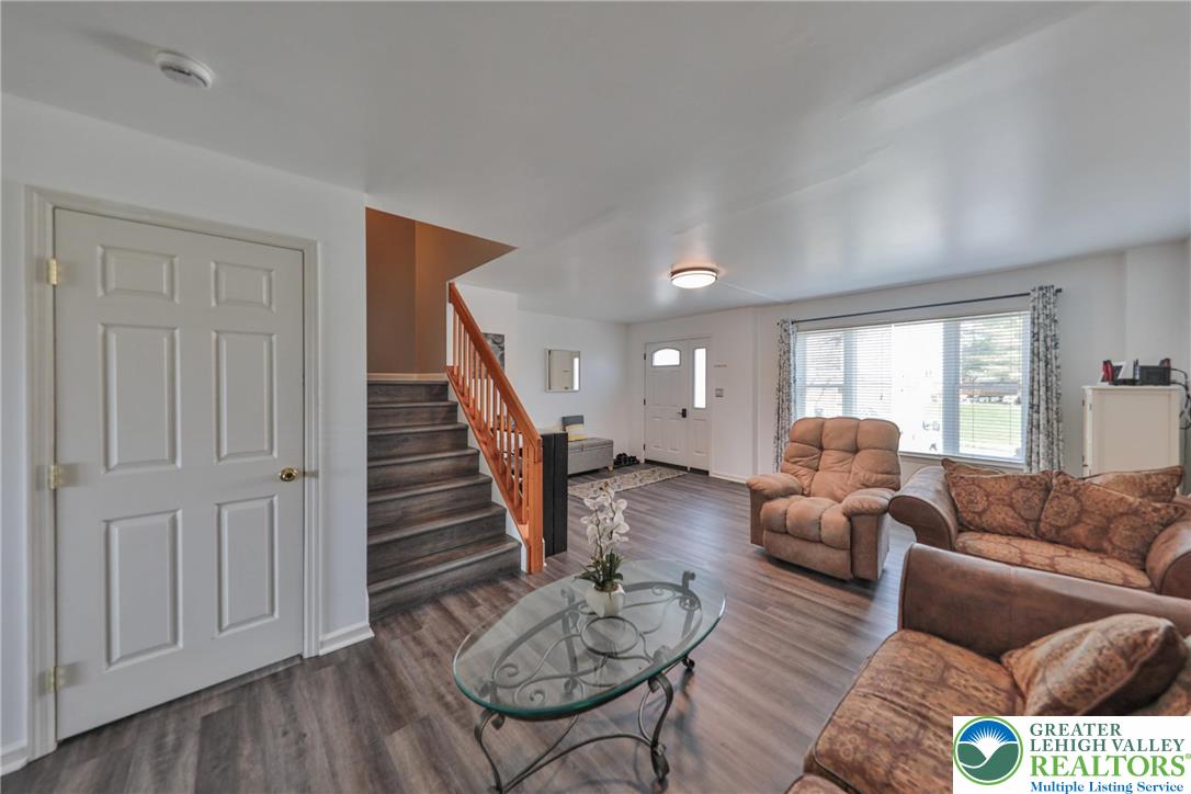 136 Cornerstone Place Whitehall, PA 18052 - Photo 5 of 39 a living room with furniture and a wooden floor