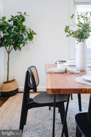 a vase of flowers sitting on a table