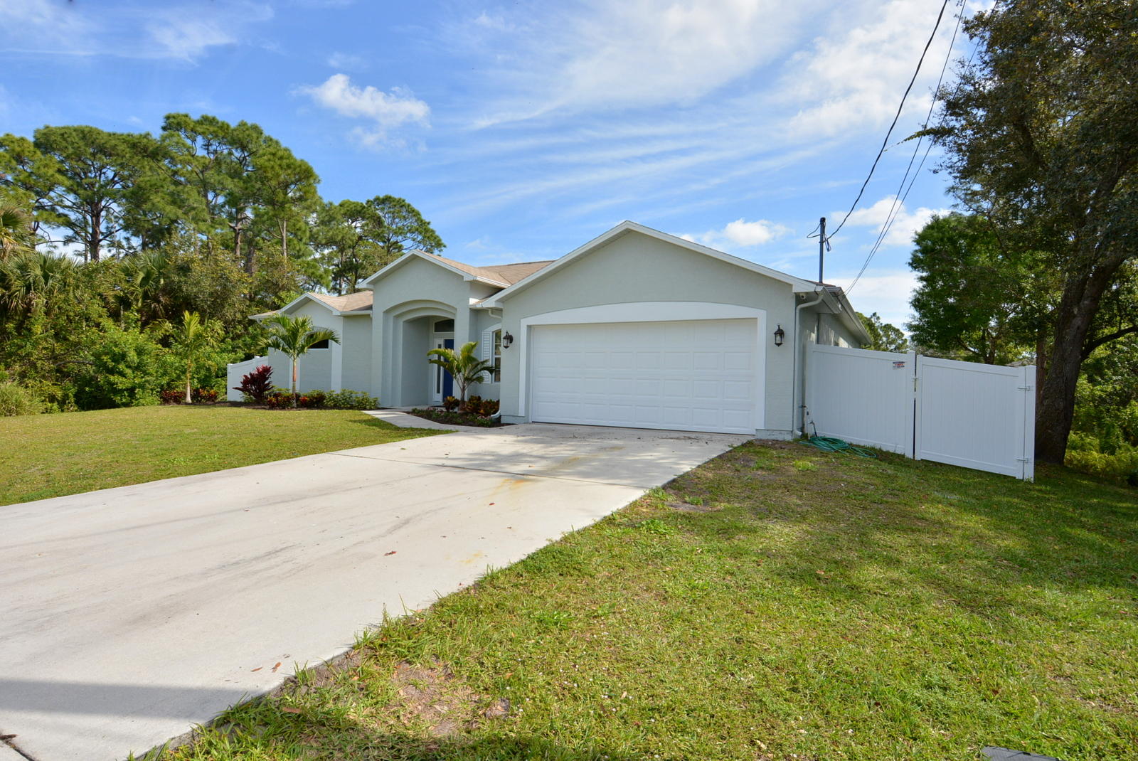 2349 Southwest Madrid Road Port St. Lucie, FL 34953 - Photo 3 of 69 Front