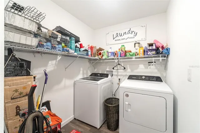 a utility room with dryer and washer