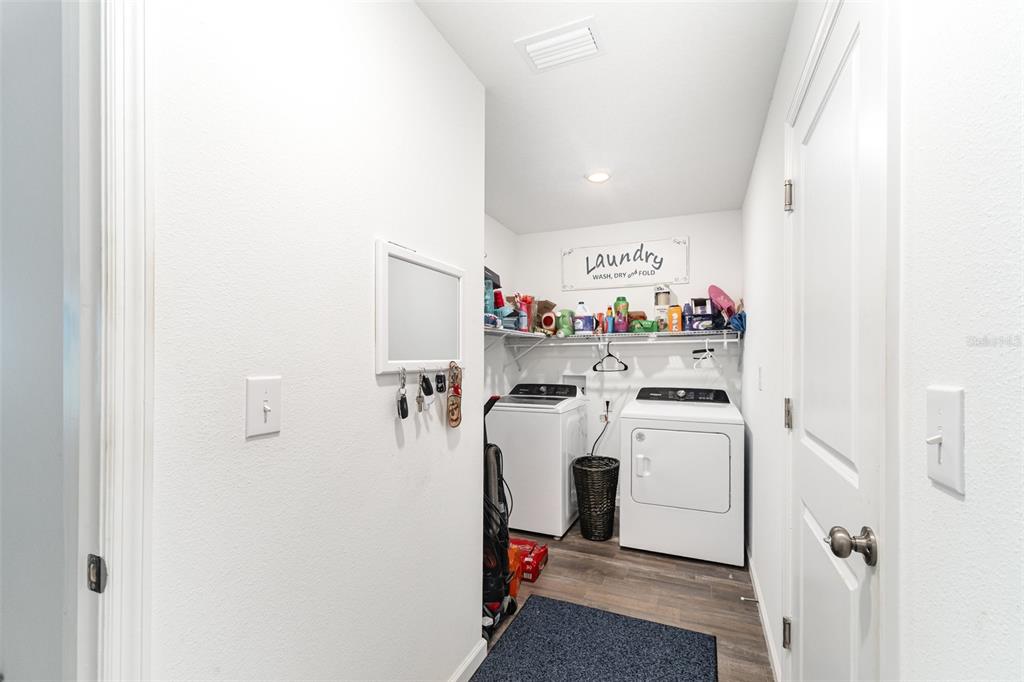 7065 North Heritage Drive Dunnellon, FL 34434 - Photo 17 of 30 a utility room with dryer and washer