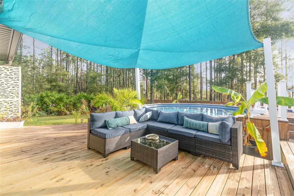 7065 North Heritage Drive Dunnellon, FL 34434 - Photo 26 of 30 a living room with furniture and a large window