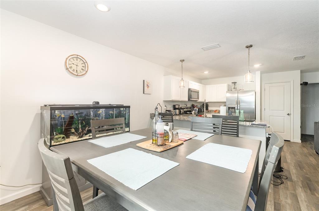 7065 North Heritage Drive Dunnellon, FL 34434 - Photo 7 of 30 a view of a dining room with furniture
