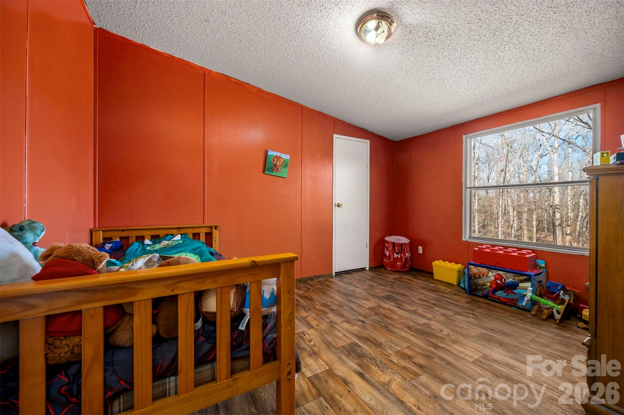 220 Mt Harmony Church Road Lawndale, NC 28090 - Photo 20 of 48 a bedroom with furniture and a window