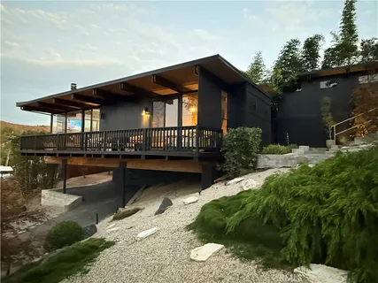 a view of house with outdoor space