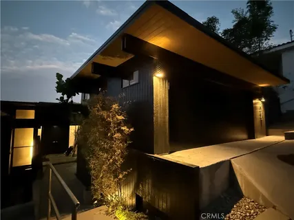 a view of a grassy area with an trees