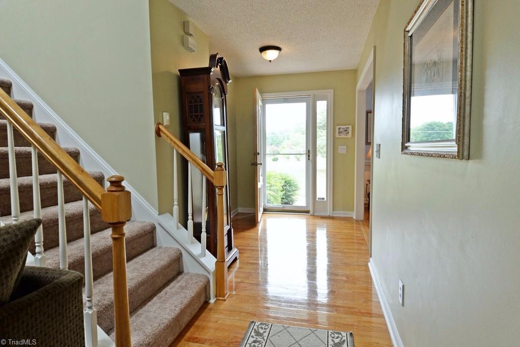 7548 Strawberry Road Summerfield, NC 27358 - Photo 3 of 20 Large foyer for welcoming guests...