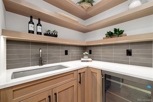 a kitchen with a sink and a window