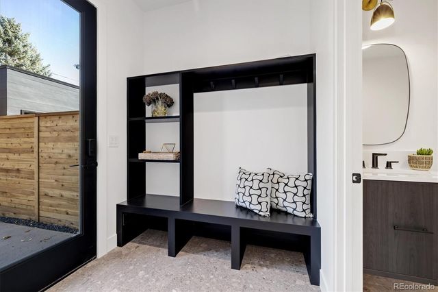 a view of entryway with a bed and a window