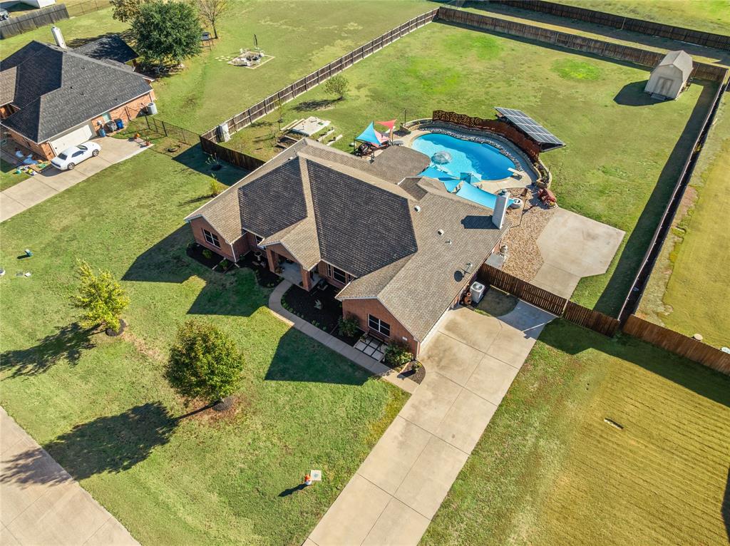 112 Springfield Lane Red Oak, TX 75165 - Photo 36 of 40 an aerial view of a house with a yard