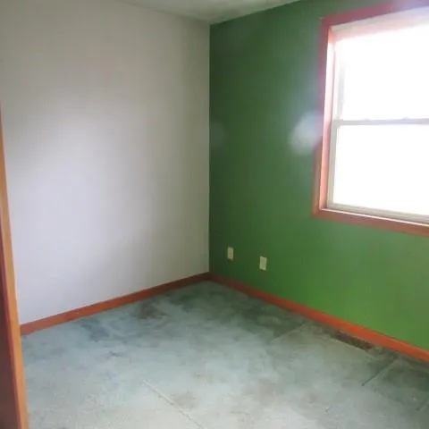 an empty room with a window