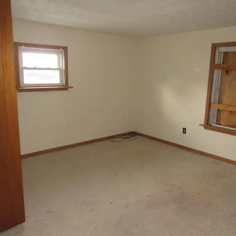 an empty room with a window