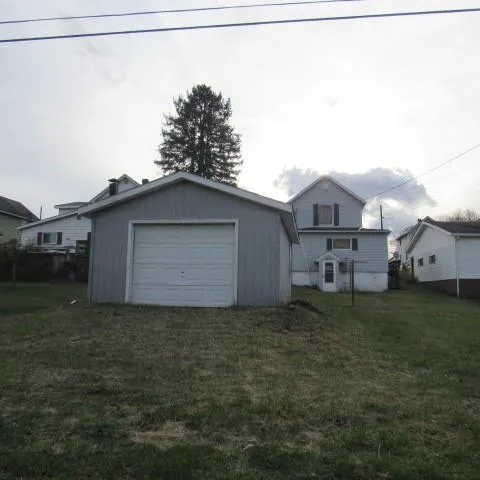 a house view with a outdoor space
