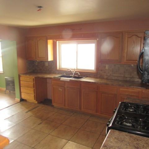 39 2nd Street Cairnbrook, PA 15924 - Photo 7 of 28 a kitchen with stainless steel appliances a sink stove and cabinets