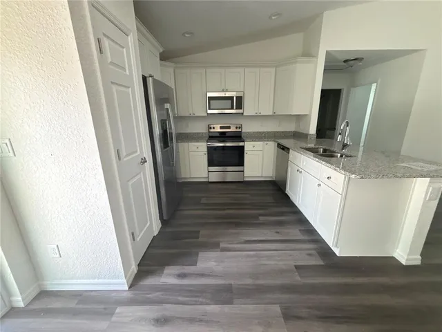 a view of backyard with green space