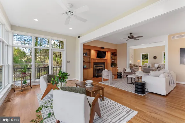 a kitchen with stainless steel appliances kitchen island granite countertop a sink and cabinets