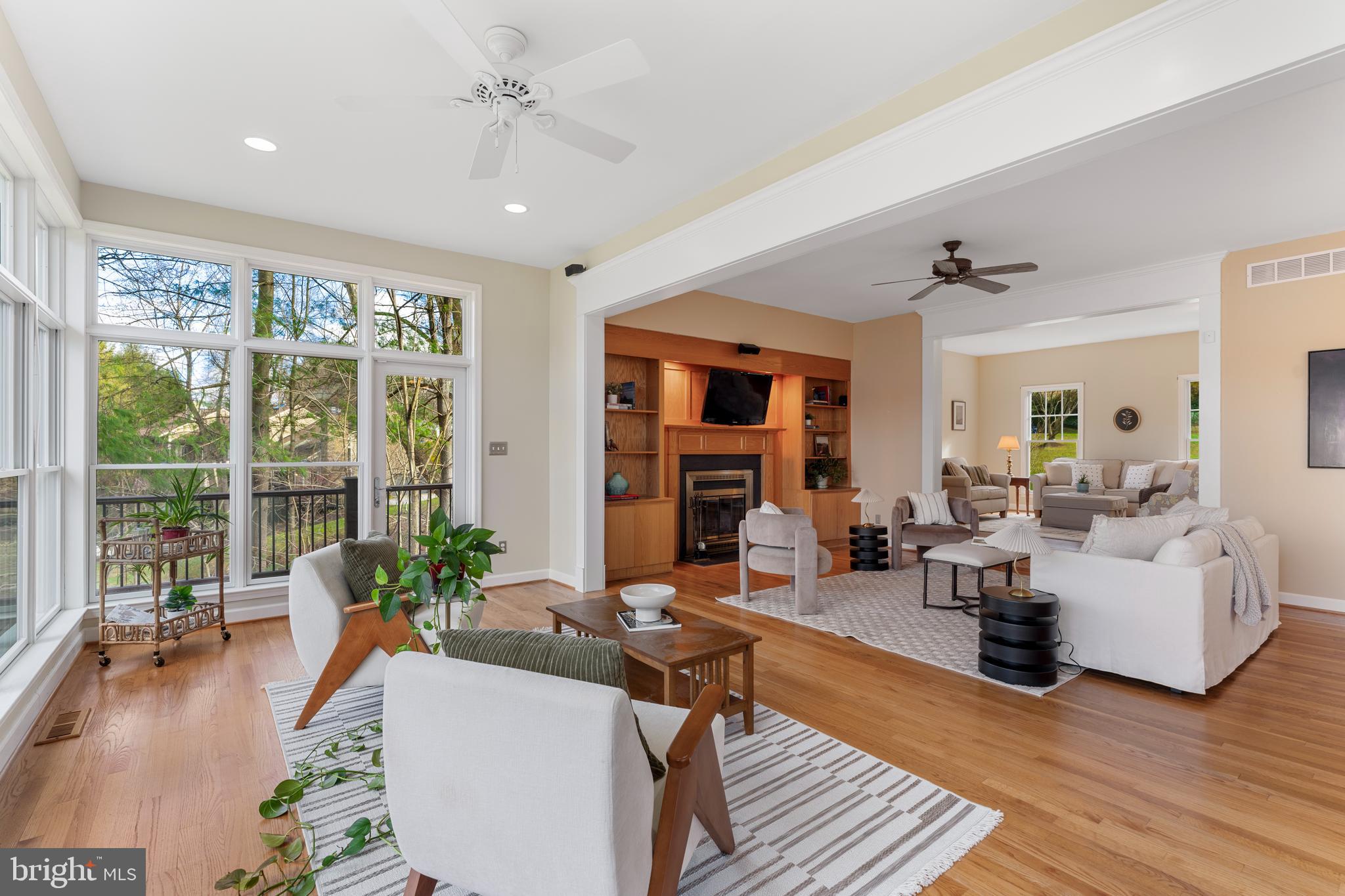 10 7 Springs Court Phoenix, MD 21131 - Photo 15 of 64 a living room with furniture large window and wooden floor