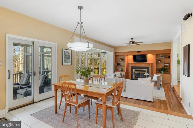 a kitchen with a window a sink and cabinets