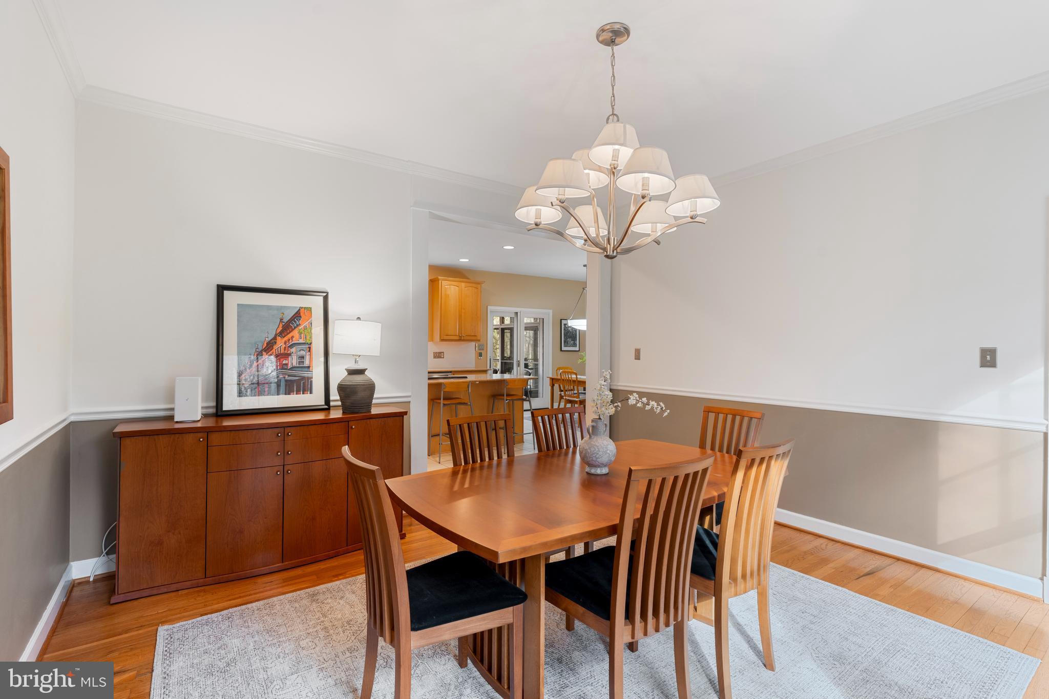 10 7 Springs Court Phoenix, MD 21131 - Photo 22 of 64 a view of a dining room with furniture wooden floor and chandelier
