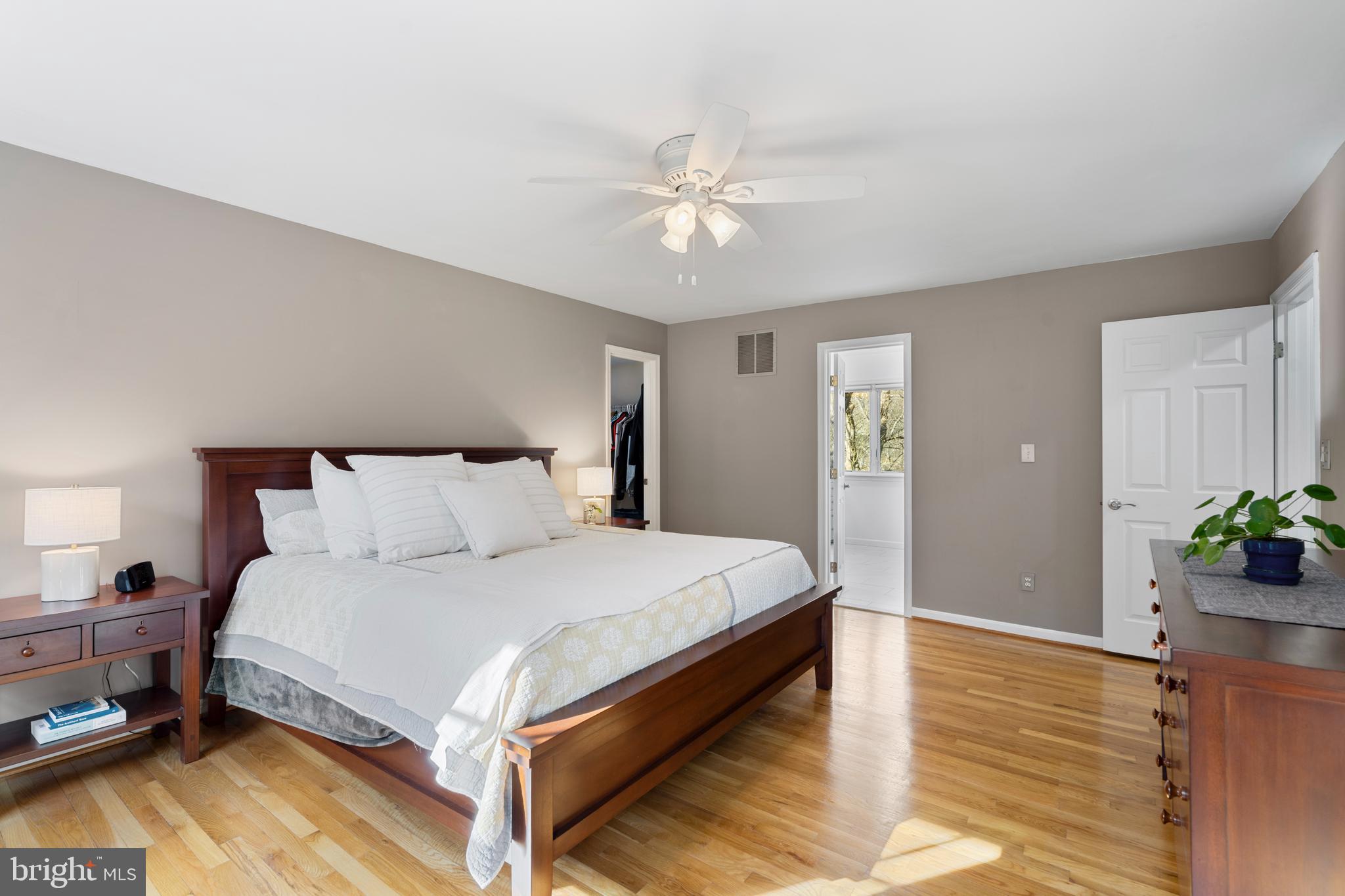 10 7 Springs Court Phoenix, MD 21131 - Photo 26 of 64 a bedroom with a bed and ceiling fan