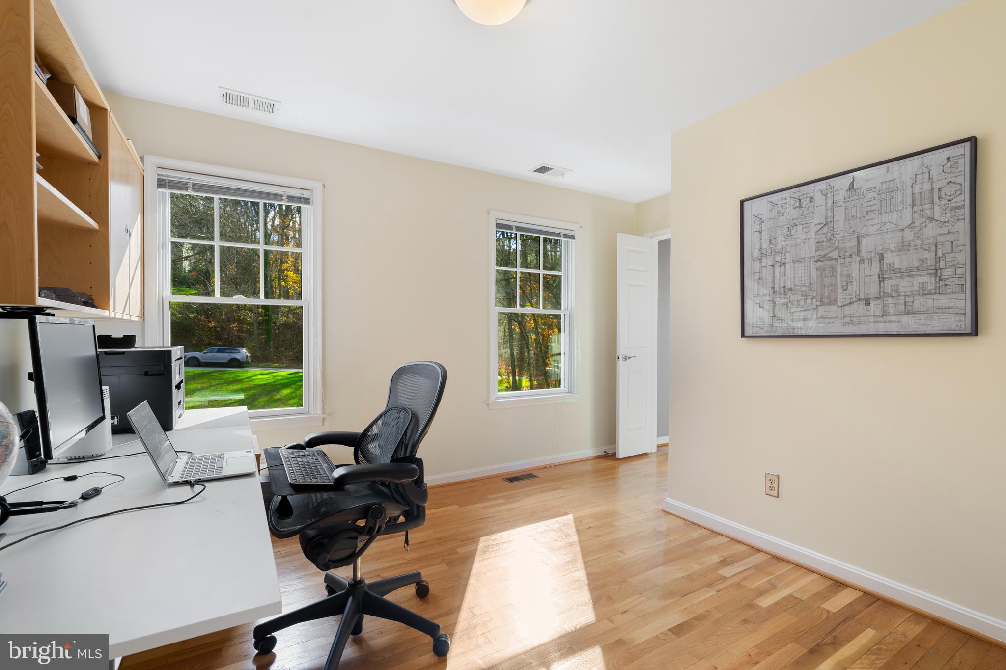 10 7 Springs Court Phoenix, MD 21131 - Photo 30 of 64 a view of a workspace with furniture and a window