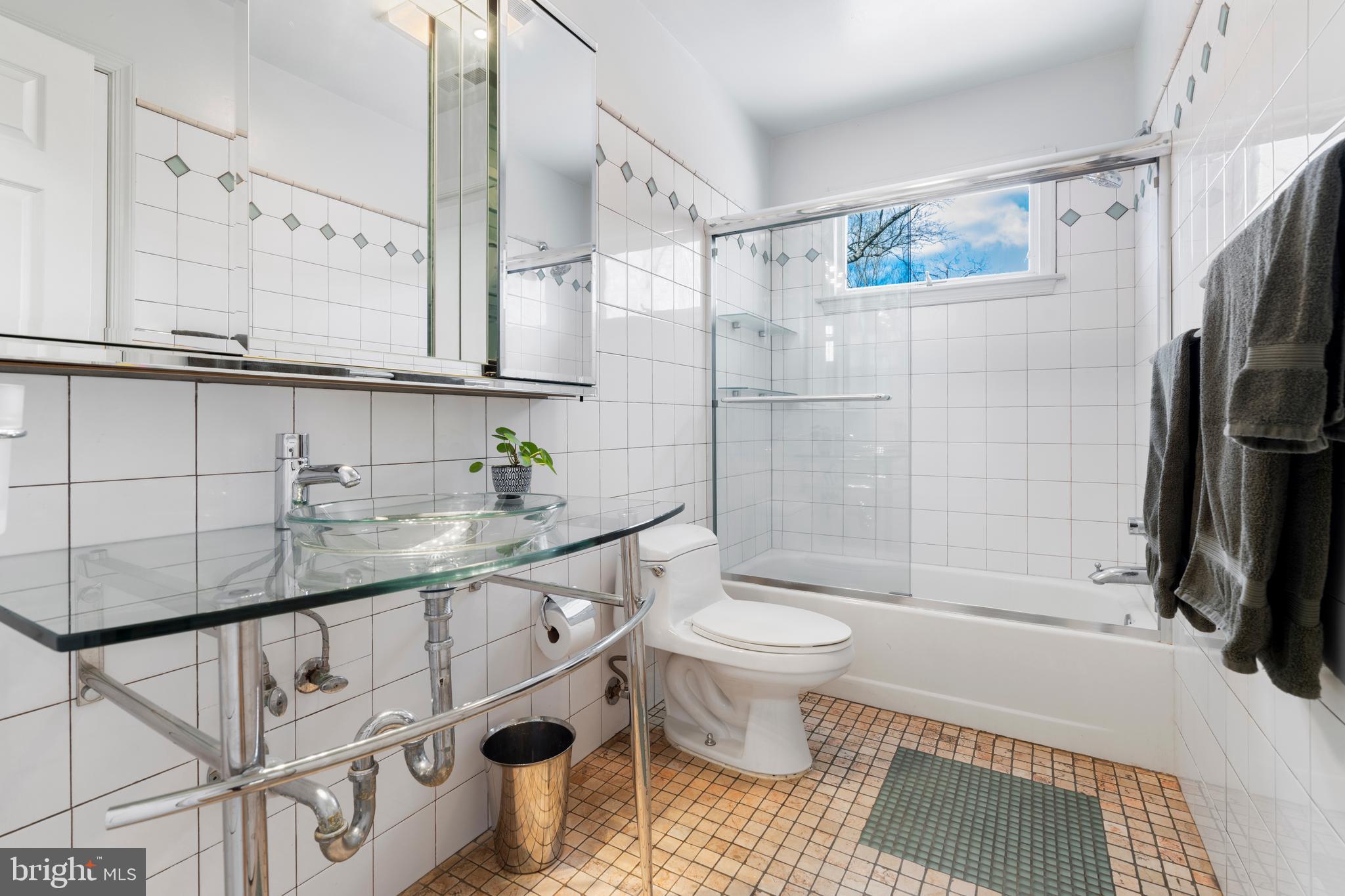 10 7 Springs Court Phoenix, MD 21131 - Photo 33 of 64 a bathroom with a granite countertop sink a toilet and shower