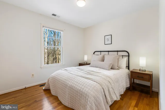 a room with furniture and pool table