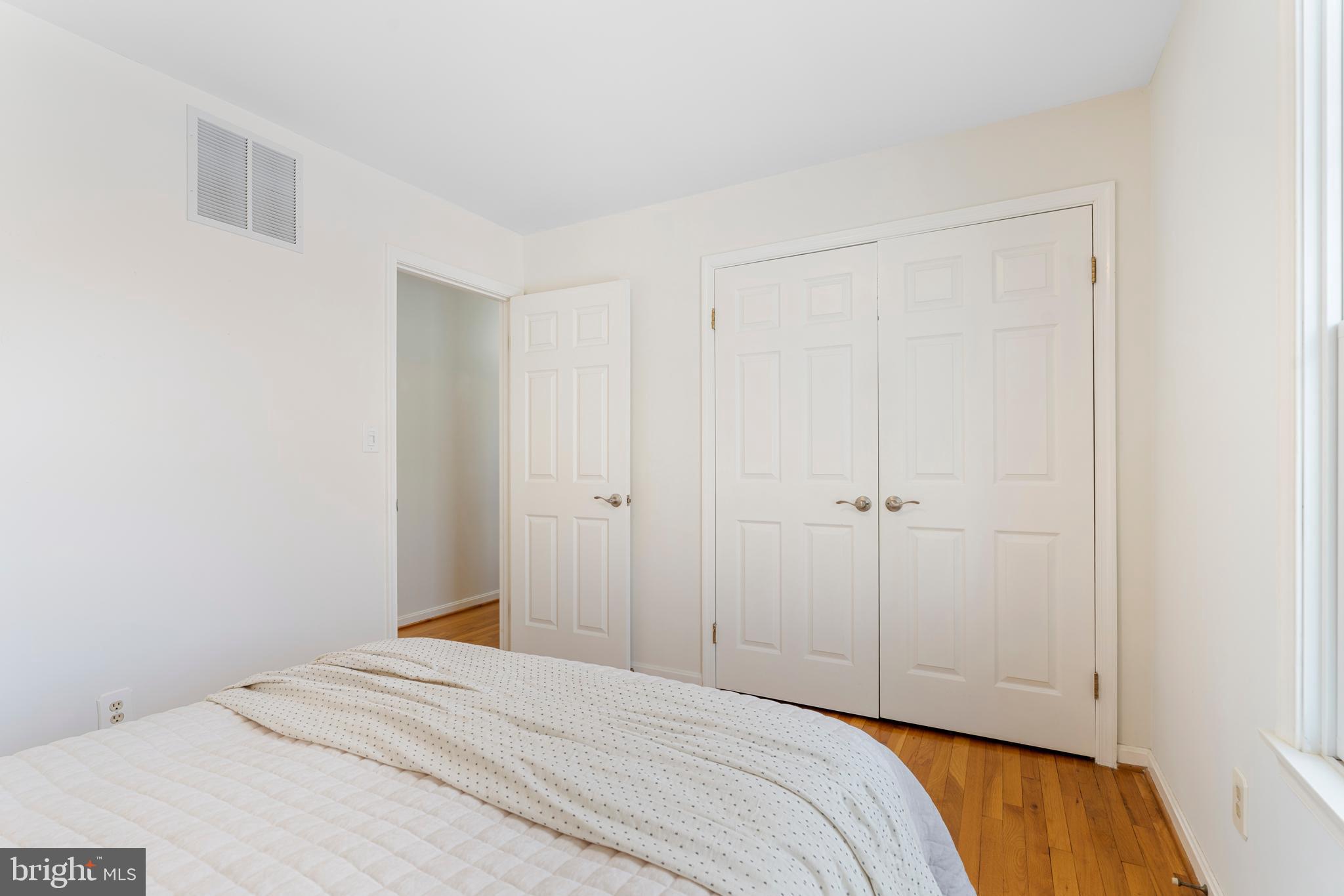 10 7 Springs Court Phoenix, MD 21131 - Photo 37 of 64 a bedroom with a bed and a closet