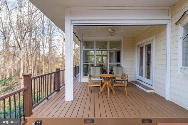 a front view of a house with a yard garage and outdoor seating