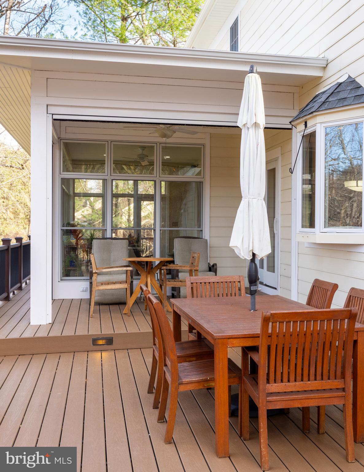10 7 Springs Court Phoenix, MD 21131 - Photo 45 of 64 a view of a dining room with furniture window and wooden floor