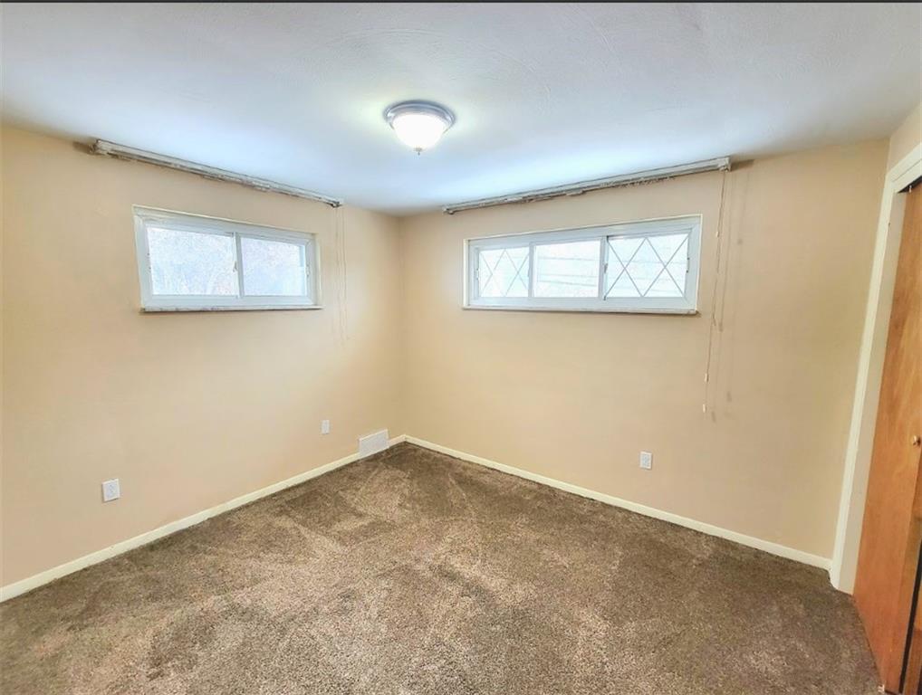 710 Parkwood Road Pittsburgh, PA 15210 - Photo 11 of 17 an empty room with windows