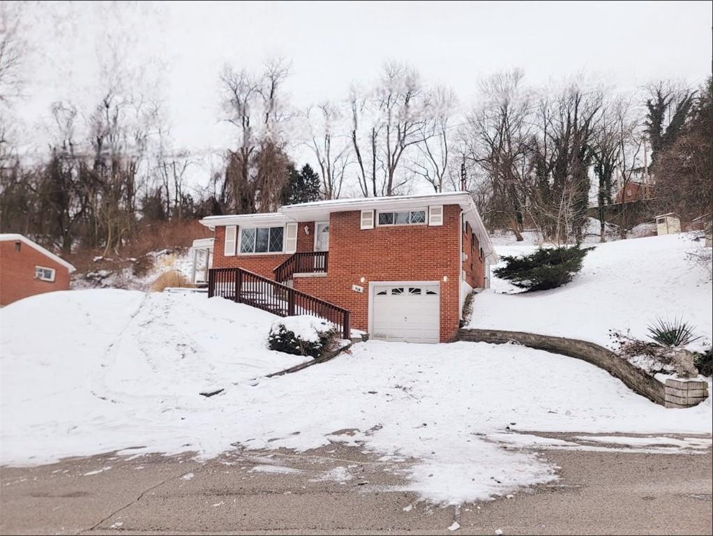 710 Parkwood Road Pittsburgh, PA 15210 - Photo 16 of 17 a view of a road with a snow on the road