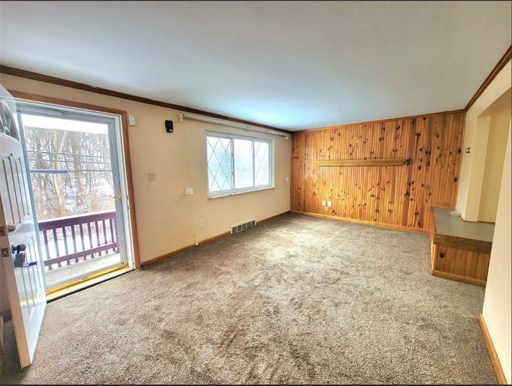 710 Parkwood Road Pittsburgh, PA 15210 - Photo 3 of 17 an empty room with windows